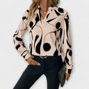 Blouse élégante à manches longues avec encolure en V